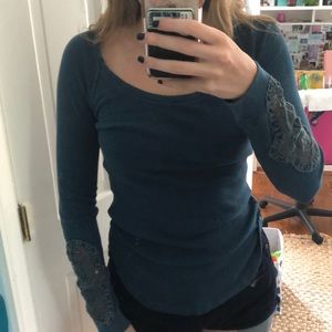 Knit top with crochet sleeves